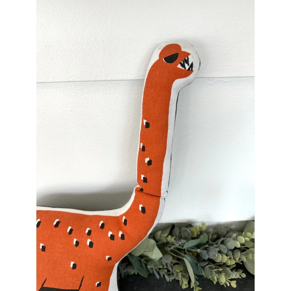 Land of Nod orange dinosaur throw pillow boys bedroom bed accent nursery dino